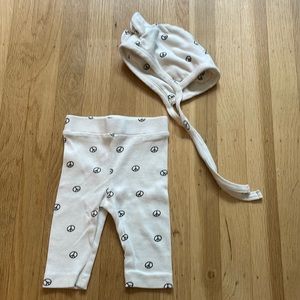 Kate Quinn peace sign legging and bear hat